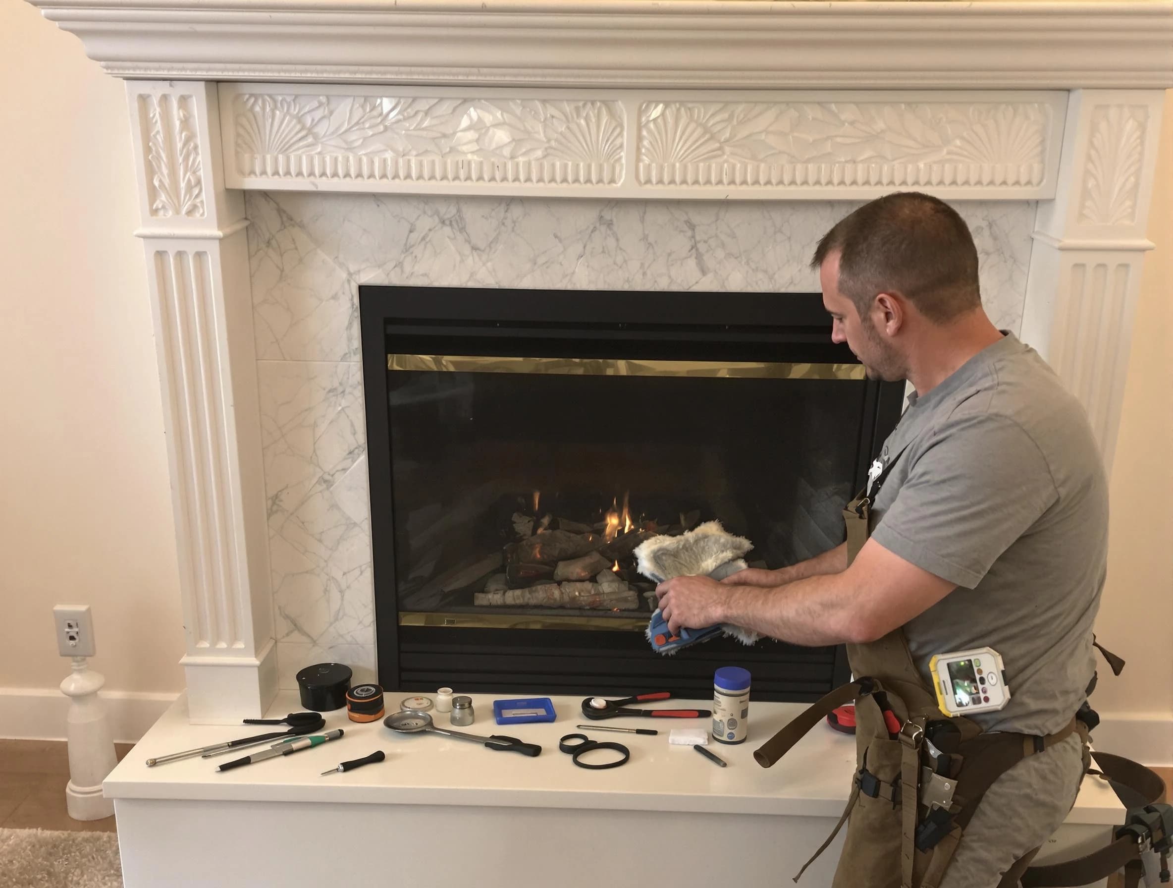 Richmond Chimney Sweep performing fireplace maintenance in Richmond, VA